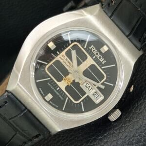 Vintage 1973 Ricoh Automatic Mens Silver Watch W/daydate & Black accents